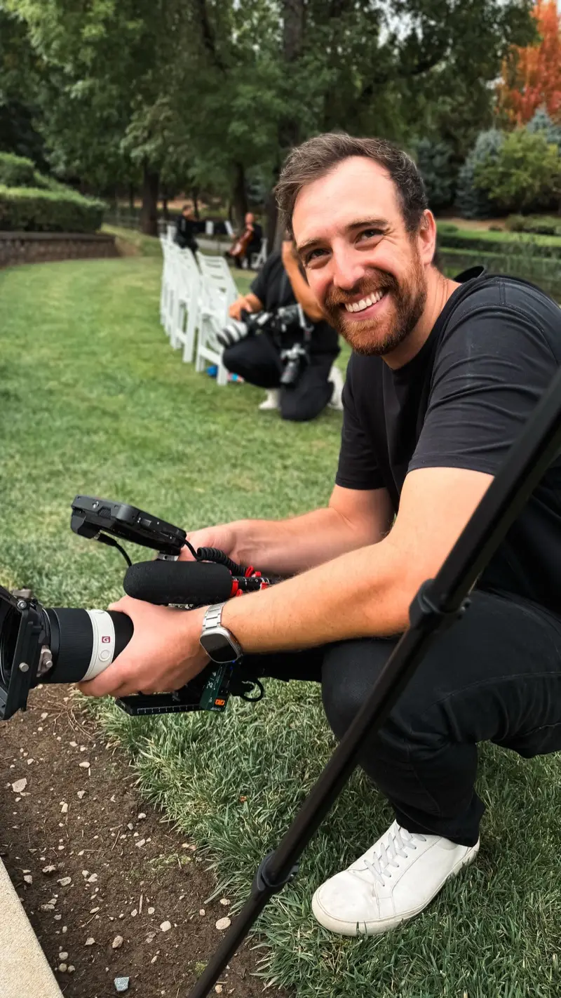 Dan, the developer of Loglux, smiling on location with his camera rig.